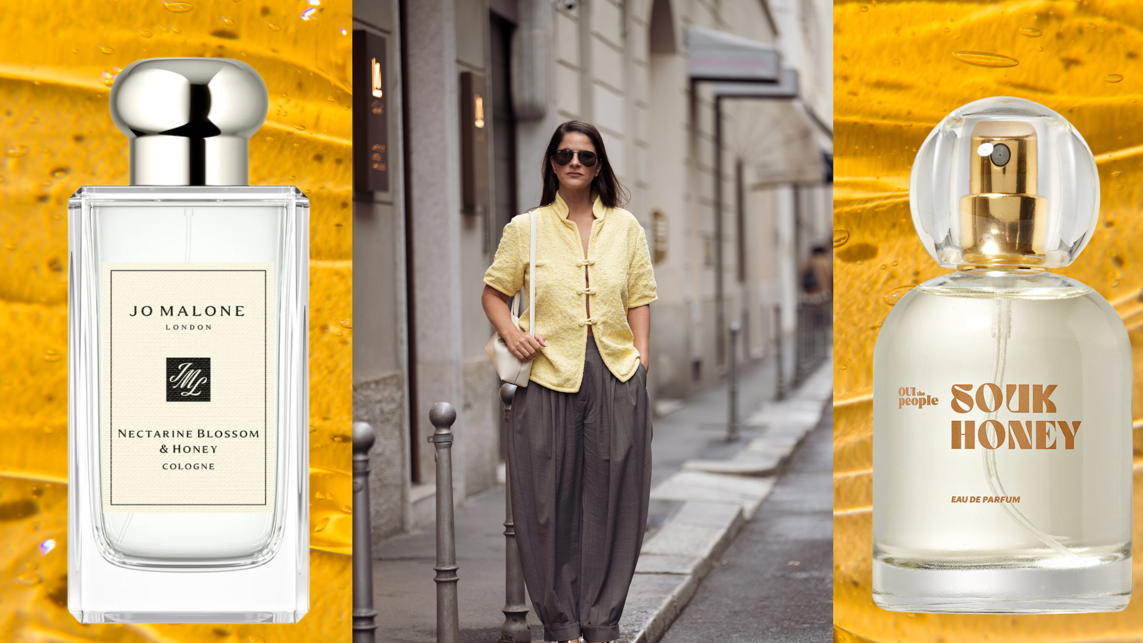 A woman wearing a yellow top and grey pants next to two bottles of honey perfume.