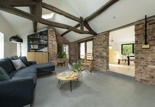 barn conversion with exposed beams and subtle lighting
