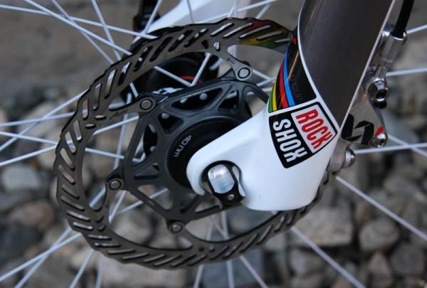 160mm front rotor and RockShox SID XX World Cup fork.