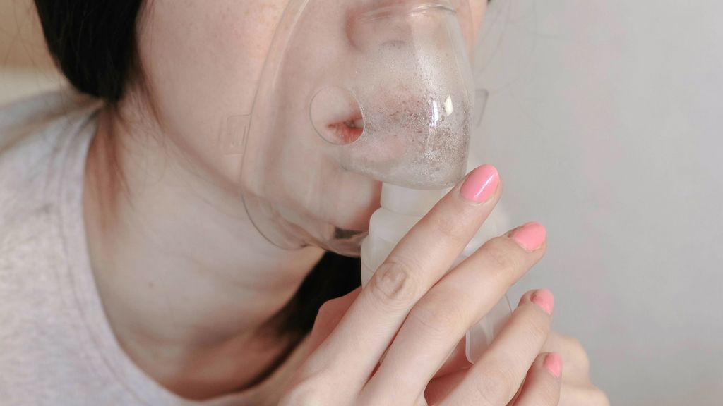 woman with nebulizer