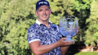 Matt Wallace poses with the trophy after winning the 2019 Par-3 Contest