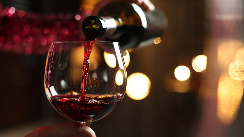 Woman pouring red wine