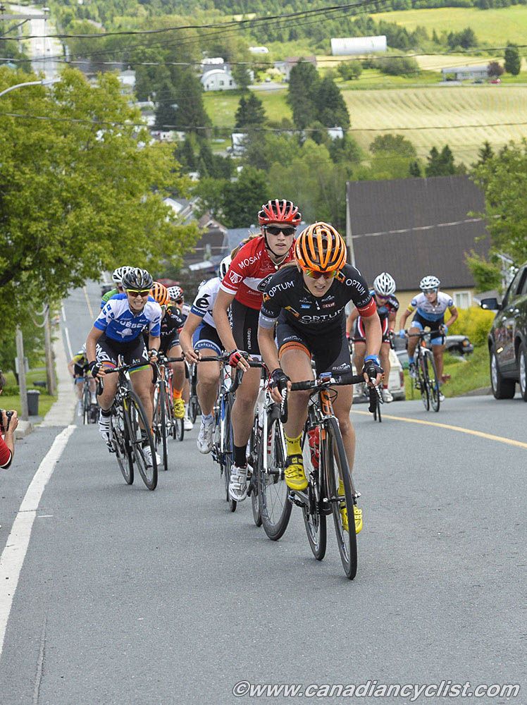 Lex Albrecht (Optum) is marked by Denise Ramsden (Trek Red Truck) on the climb