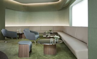Bayerischer Hof hotel seating area showing table and corner chairs