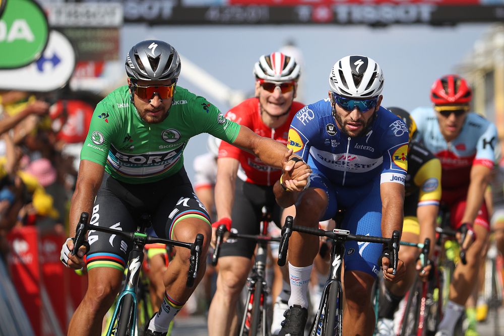 Peter Sagan congratulates Fernando Gaviria as they cross the line during stage 4 at the Tour de France
