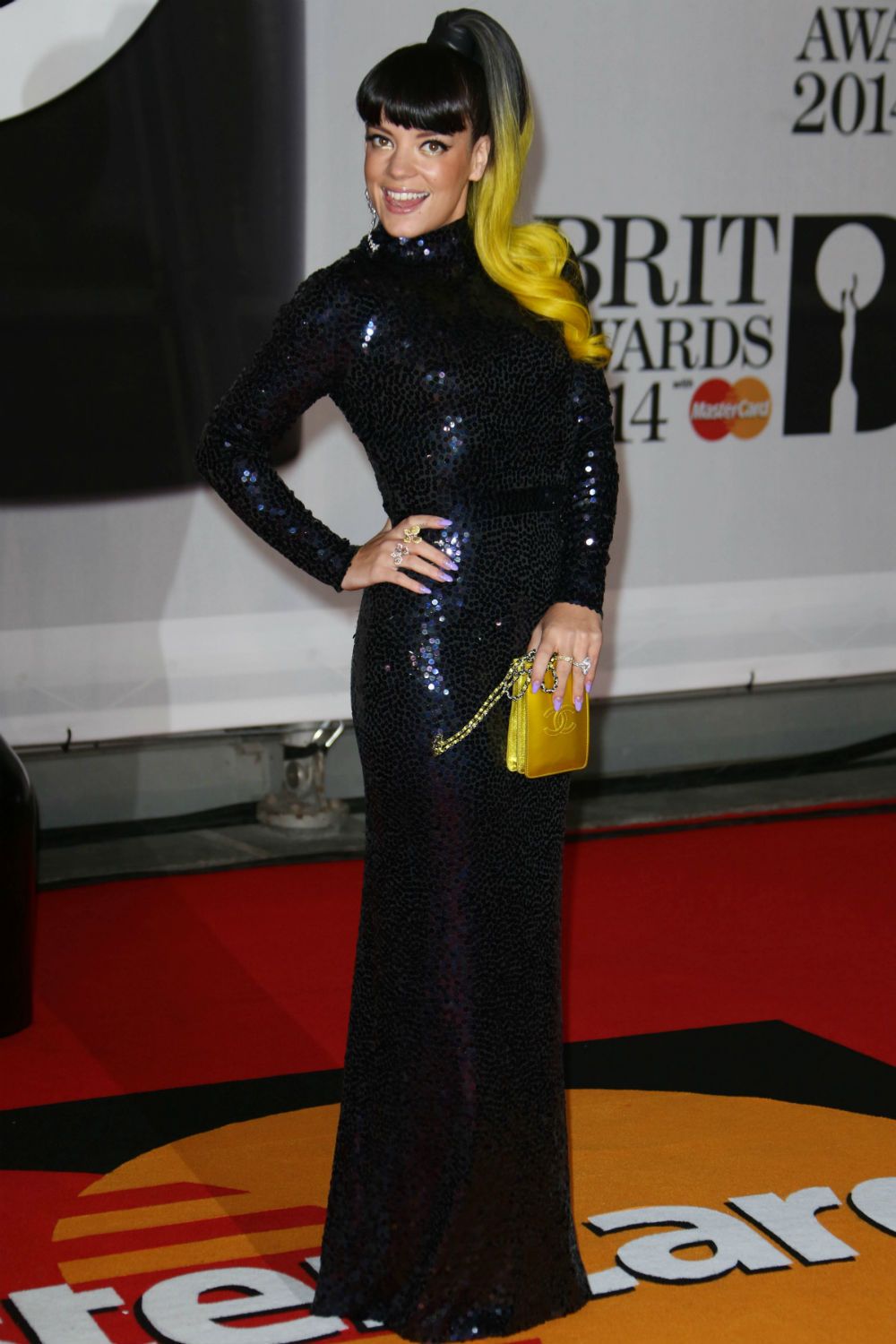 Lily Allen had a neon yellow dip-dye ponytail at the Brit Awards 2014.