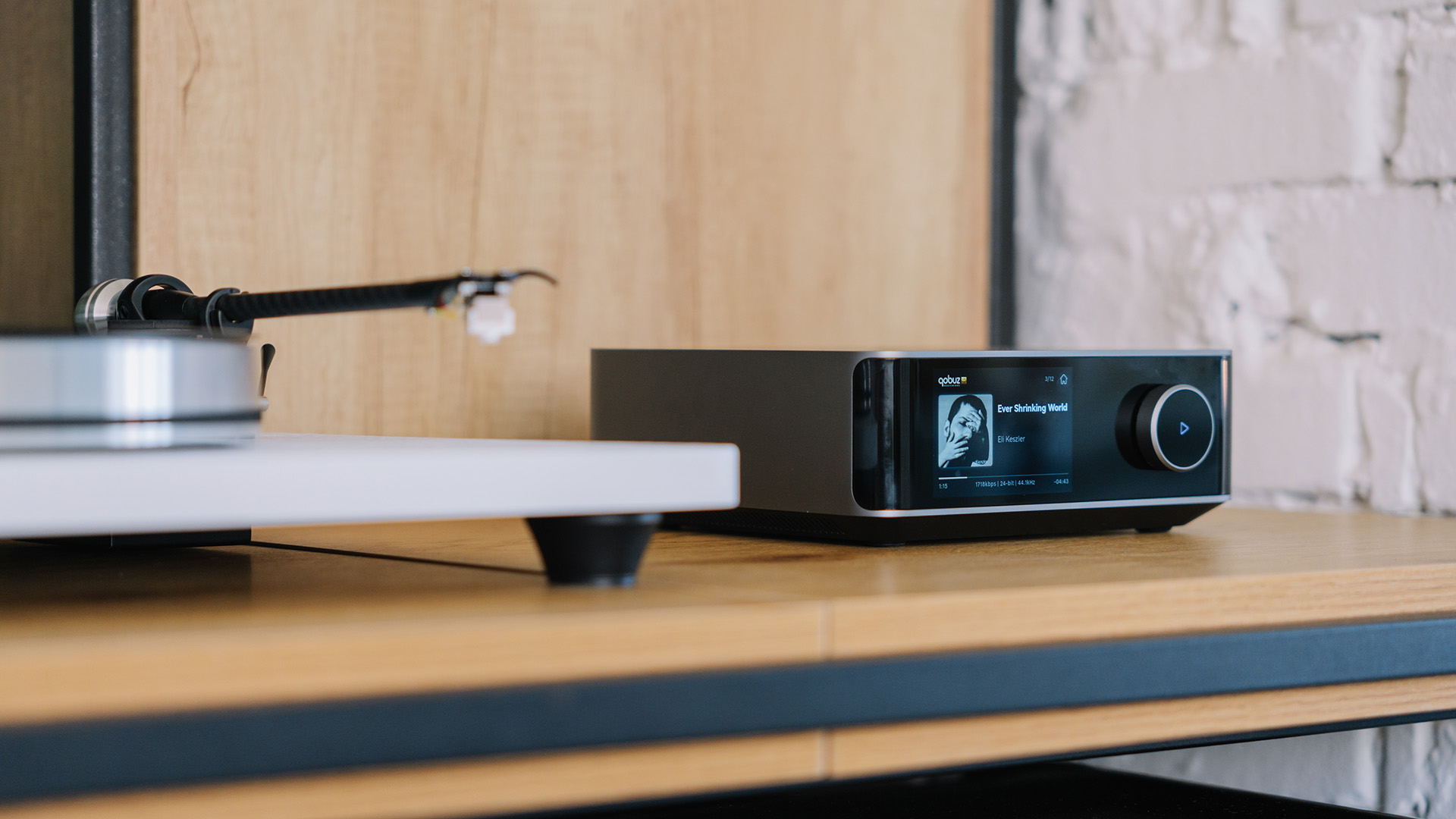 WiiM Amp Ultra shown next to turntable