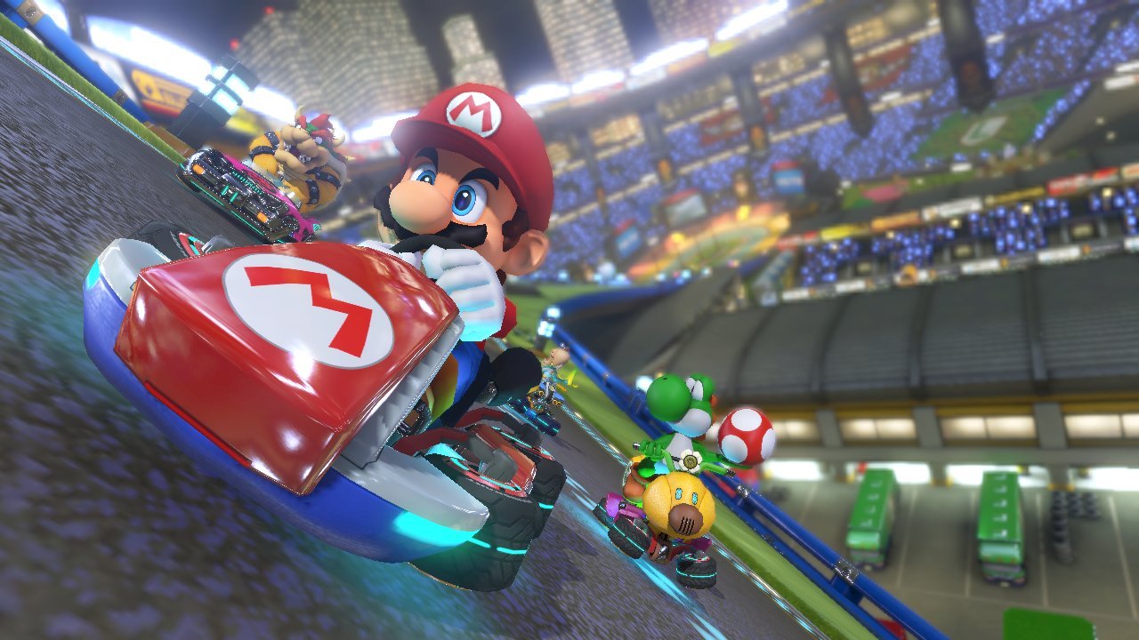 Yoshi approaches Mario with a super mushroom in Mario Kart 8 Deluxe