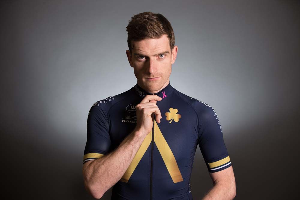 Martyn Irvine models the 2017 Aqua Blue Sport jersey