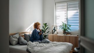 Woman looking out of the window