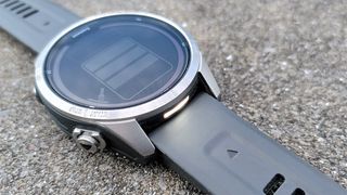 Garmin Fenix 7 Pro GPS watch with flashlight on