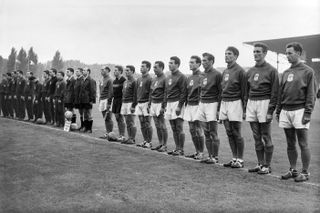 Jozsef Bozsik and his Hungary team-mates line up for a friendly against France in 1956.