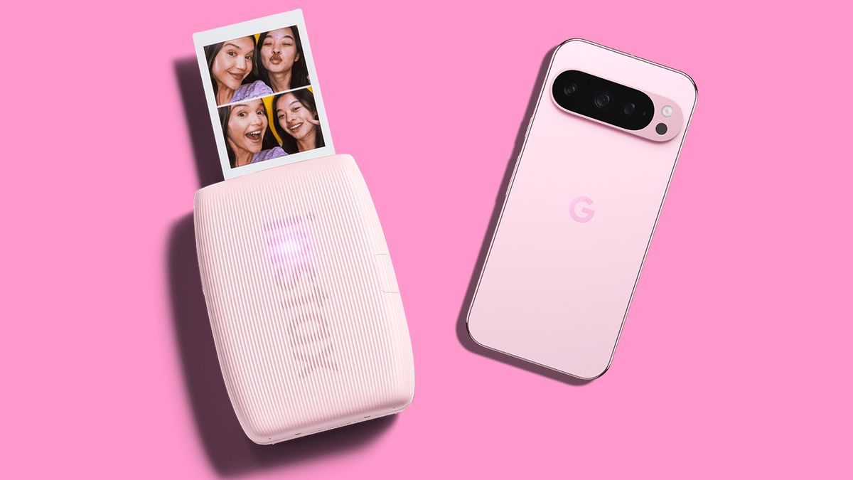 The Instax Mini Link 3 in Rose Quarts sits with the same color Google Pixel 9 smartphone on a pink background