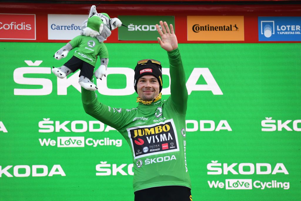 ALTO DE LA FARRAPONA LAGOS DE SOMIEDO SPAIN OCTOBER 31 Podium Primoz Roglic of Slovenia and Team Jumbo Visma Green Points Jersey Celebration Mascot during the 75th Tour of Spain 2020 Stage 11 a 170km stage from Villaviciosa to Alto de La Farrapona Lagos de Somiedo 1708m lavuelta LaVuelta20 La Vuelta on October 31 2020 in Alto de La Farrapona Lagos de Somiedo Spain Photo by David RamosGetty Images