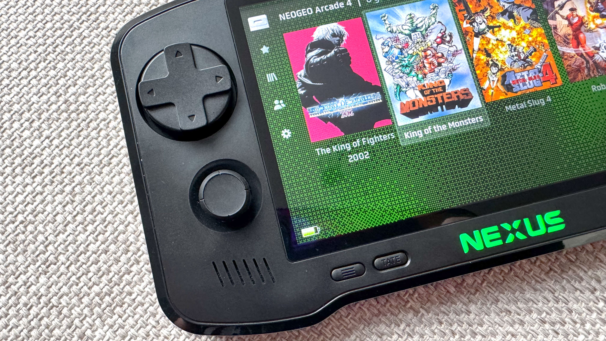 Evercade Nexus handheld, focused on the left analog stick