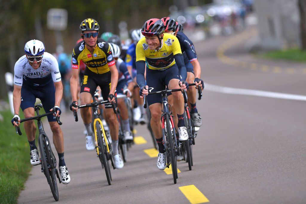 SAINTIMIER SWITZERLAND APRIL 29 Michael Woods of Canada and Team Israel StartUp Nation Sepp Kuss of United States and Team Jumbo Visma Rohan Dennis of Australia and Team INEOS Grenadiers Yellow Leader Jersey during the 74th Tour De Romandie 2021 Stage 2 a 1657km stage from La Neuveville to SaintImier TDR2021 TDRnonstop UCIworldtour on April 29 2021 in SaintImier Switzerland Photo by Luc ClaessenGetty Images