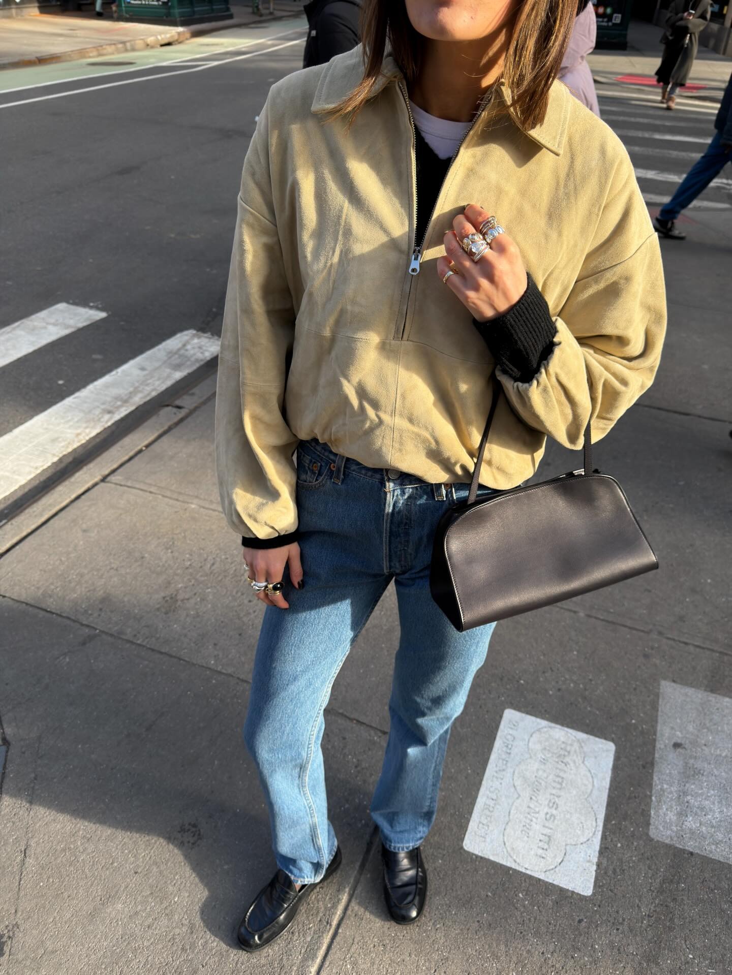 Coco wearing the Peggy Clutch