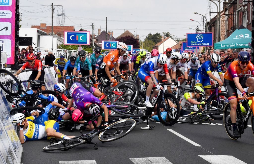 Riders crash as they cross the finish line during the 161 km between Dunkirk and Aniche first stage of the 4 jours de Dunkerque Four days of Dunkirk cycling race in Aniche northern France on May 3 2022 Dutch rider Arvid de Kleijn Human Powered Health was declared winner of the first stage of the Four Days of Dunkerque on May 3 2022 in Aniche after Australian rider Sam Welsford was dropped Welsford Team DSM was the first to cross the line but was considered responsible for the crash that sent Arnaud De Lie Lotto Soudal and Daniel McLay Arkea Samsic to the ground Photo by FRANCOIS LO PRESTI AFP Photo by FRANCOIS LO PRESTIAFP via Getty Images