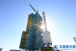 A Chinese Long March 2F rocket rolls out to its launch pad at the Jiuquan Satellite Launch Center in northwest China to launch the Tiangong-2 space laboratory.