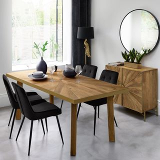 dining room with table and black chairs