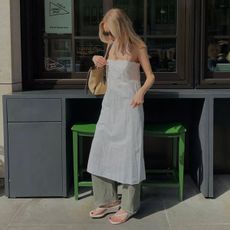 Girl posing in heeled thong wedge sandals