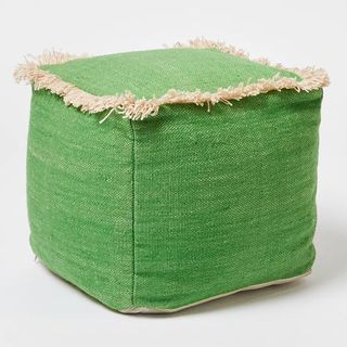 Green square footstool with raffia fringe