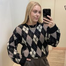 Shopping Editor, Florrie Alexander wears M&S' argyle crew-neck jumper (£38).
