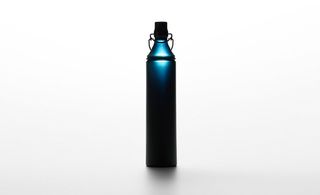 Nendo’s bottle is a slender matt black flacon with slight indents