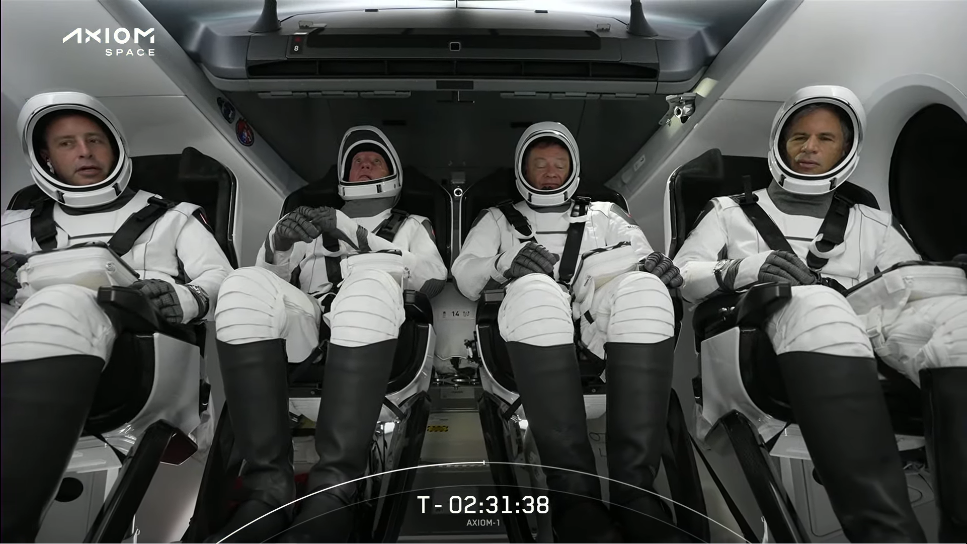 The four astronauts of Ax-1 strapped into the Endeavour before comms check.