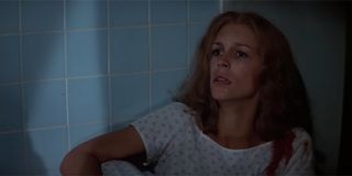 Laurie Strode backed into a corner as Michael Myers approaches in Halloween II