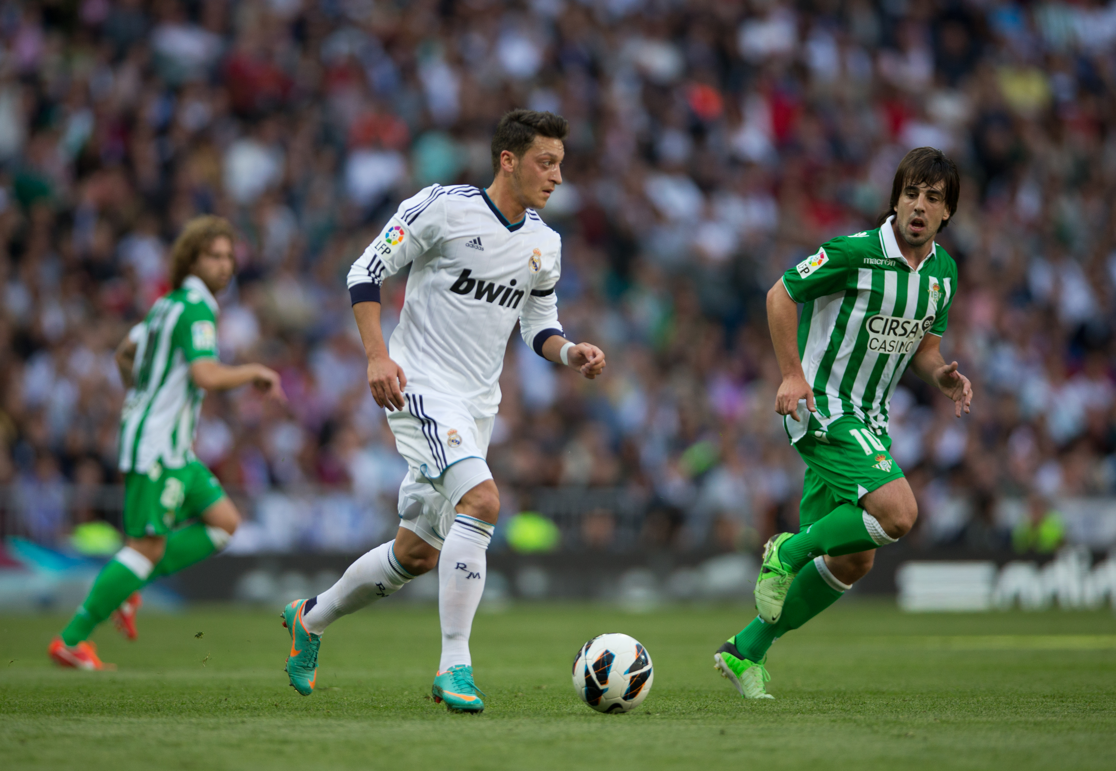 Mesut Ozil on the ball for Real Madrid against Real Betis in April 2013.