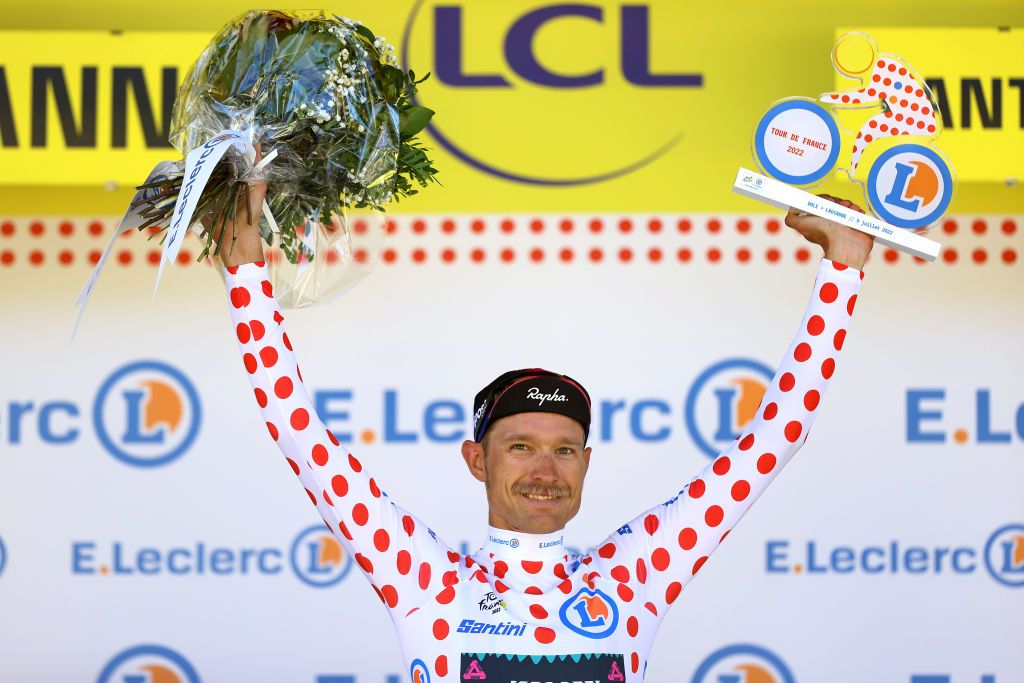 LAUSANNE SWITZERLAND JULY 09 Magnus Cort Nielsen of Denmark and Team EF Education Easypost Polka Dot Mountain Jersey celebrates at podium during the 109th Tour de France 2022 Stage 8 a 1863km stage from Dole to Lausanne Cte du Stade olympique 602m TDF2022 WorldTour on July 09 2022 in Lausanne Switzerland Photo by Michael SteeleGetty Images