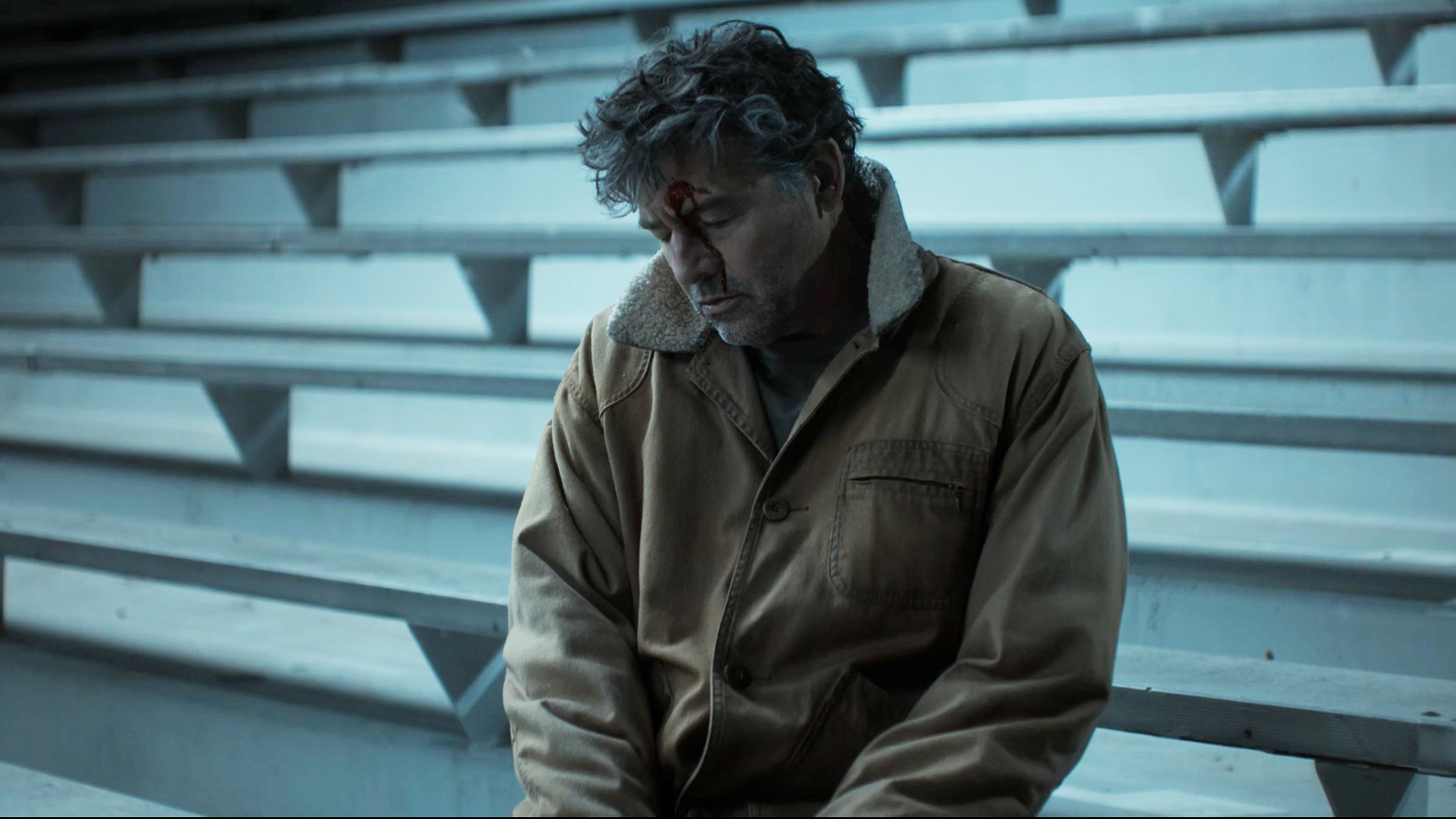 A slumped and dead Hal Jordan sitting down in the Lanterns season 1 finale