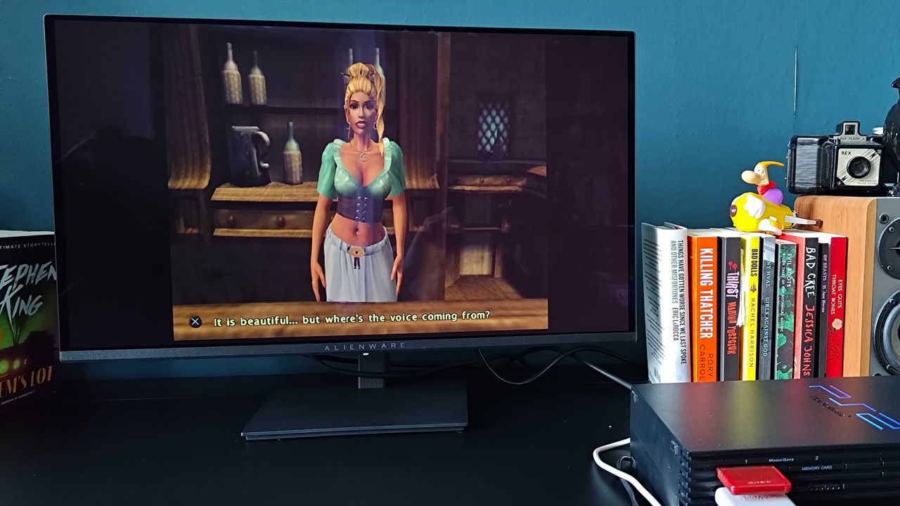 Alienware AW2726DM monitor with PS2 connected via upscaler and Baldur's Gate Dark Alliance gameplay on screen and squashed visuals at 960p.