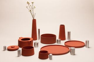 A range of red ceramic pots