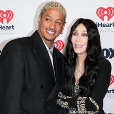 Alexander Edwards and Cher pose in the press room during the 2024 iHeartRadio Music Awards at Dolby Theatre on April 01, 2024 in Hollywood, California. 