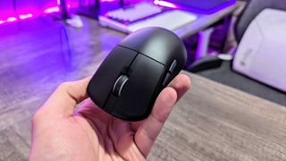 Image of the ASUS ROG Harpe Ace Mini wireless gaming mouse.