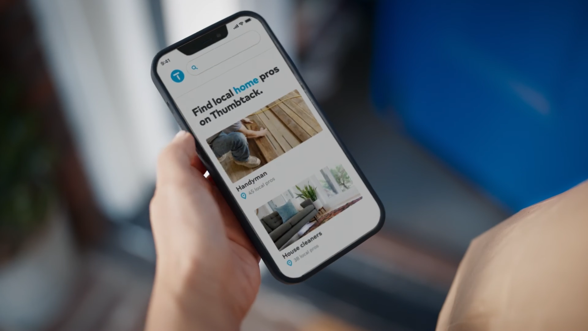 A person using the Thumbtack app to find local pros