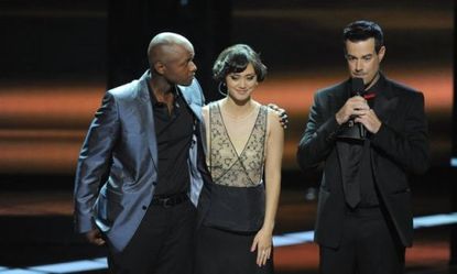 Moments before The Voice winner Javier Colon (left) was announced, the singer stands with fellow contestant and runner up Dia Frampton.