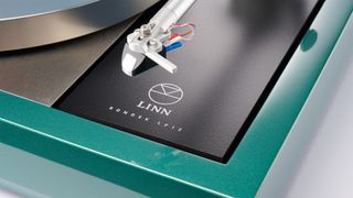 Linn Majik LP12 MC turntable close up on corner showing cartridge and Linn logo