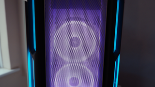 Corsair iCUE 5000T RGB mid-tower PC case with RGB lighting enabled in blue and pink