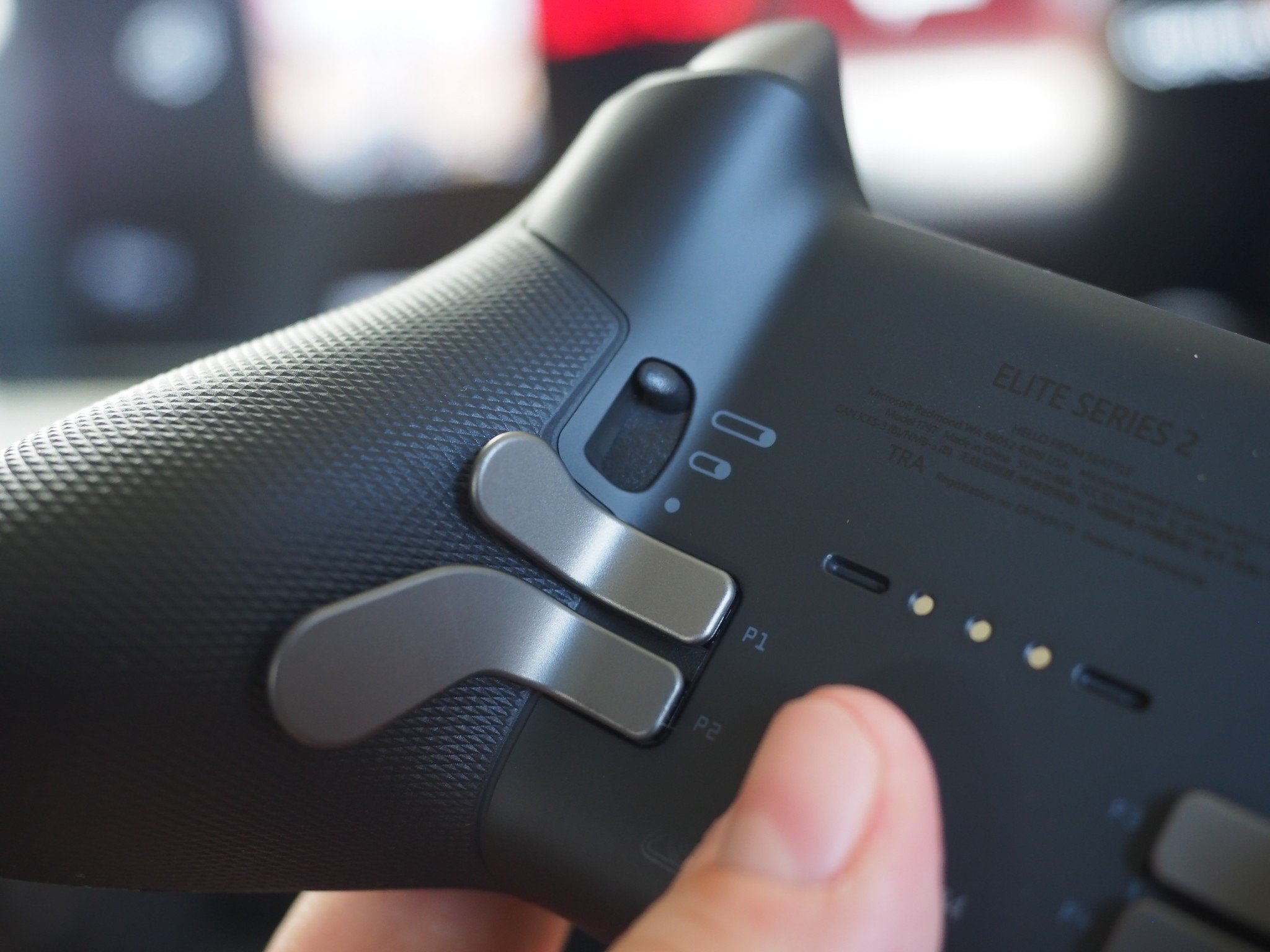 Photograph of the Xbox Elite Series 2 Wireless Controller's back paddles and hair-trigger locks taken by Jez Corden