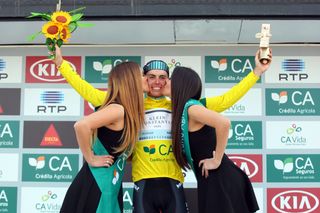 Enric Mas in yellow on the stage 2 podium at Volta ao Alentejo