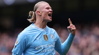 Erling Haaland celebrates after scoring for Manchester City against Everton in February 2024.