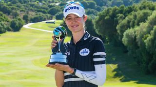 Nelly Korda with the Trophy following her win at Aramco Team Series Sotogrande in 2022.jpeg