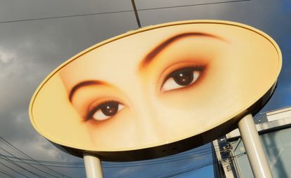 artwork of eyes on road signage, part of Cartier in Japan exhibition
