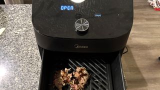 Midea Dual Zone Air Fryer open drawer with food