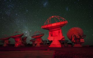 ALMA Antennae Bathed in Red Light Space Wallpaper