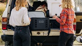 Yeti Hopper Flip soft cooler loaded into the back of a truck