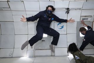 A passenger enjoys floating aboard the Aug. 16, 2020 Zero-G flight.